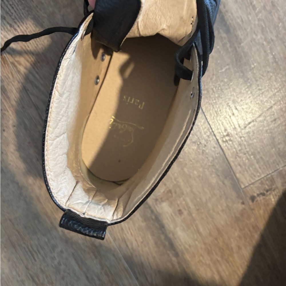 Men’s black leather high top Christian louboutins